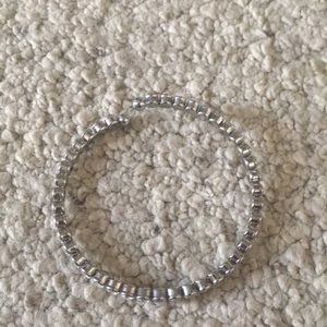 Silver bracelet with studs and adjustable